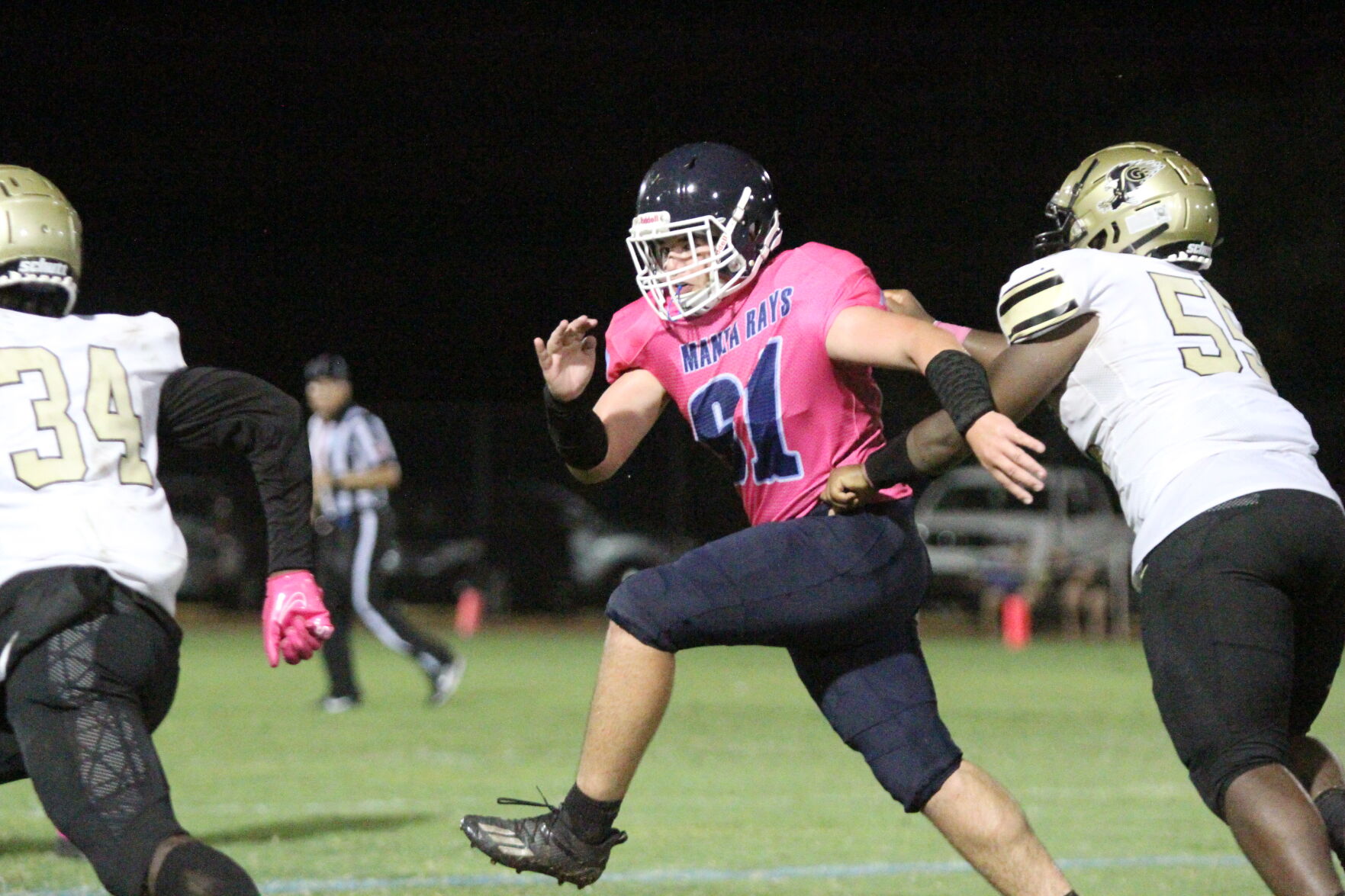 MIA Falls 2. Middle linebacker Hunter Pisano pursues the Gateway ball carrier. Pisano picked off a Gateway pass earlier in the game..jpeg